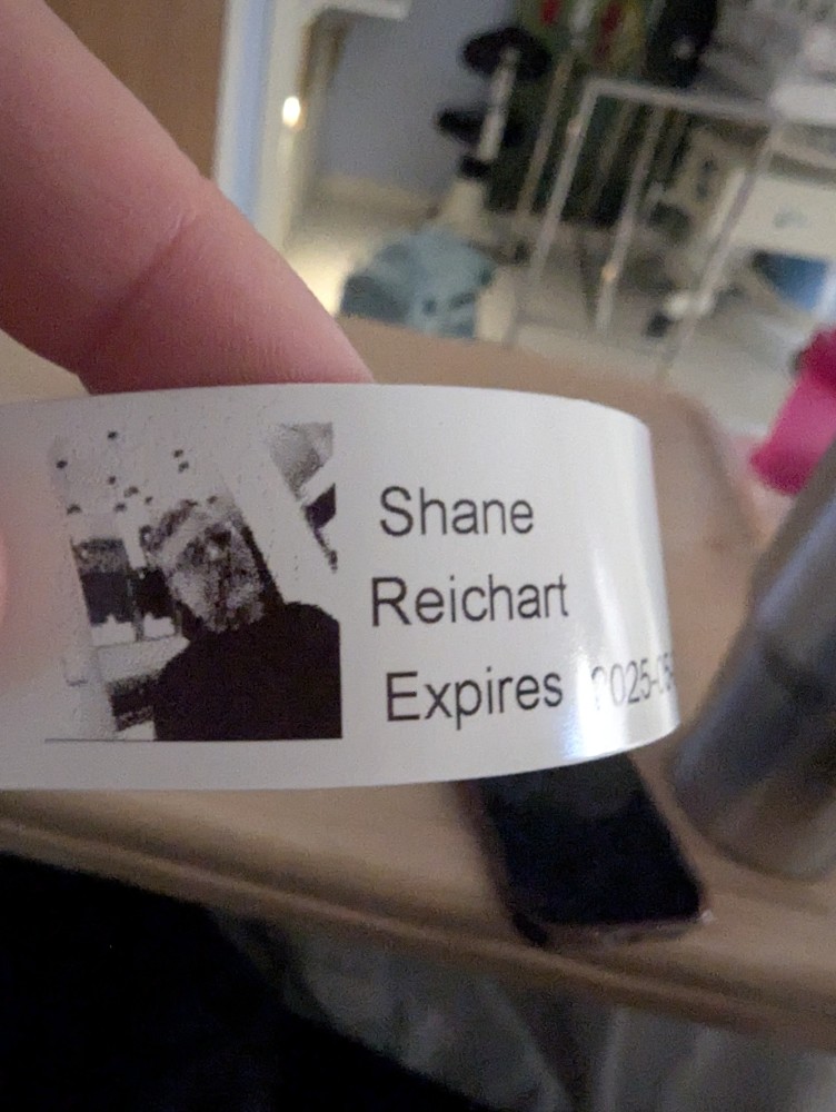 Shane Reichart's hospital arm band